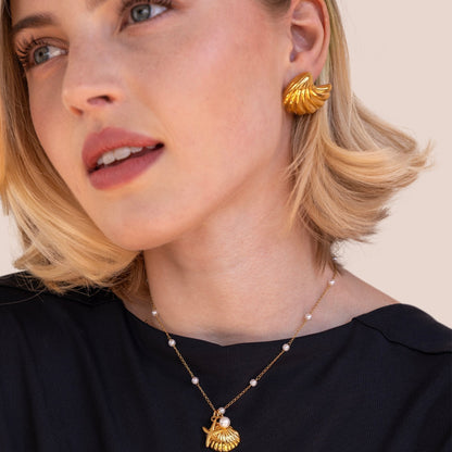 Guldpläterade snäckörhängen