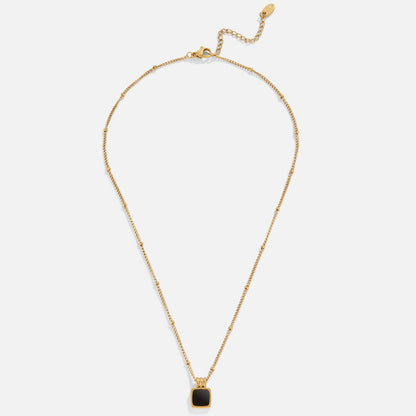 Midnight Chic – Elegant halsband i guld och svart
