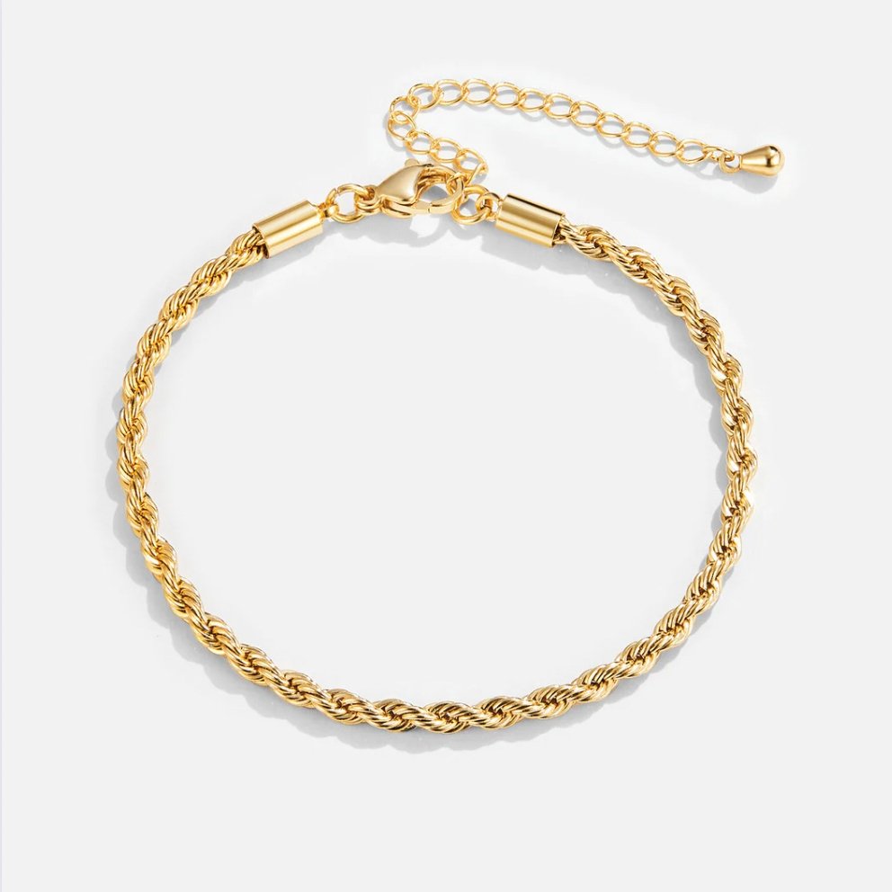 Elegant flätat armband i guld