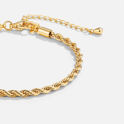 Elegant flätat armband i guld